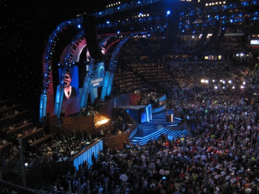 Wide view of the lit convention stage and packed arena during the 2008 DNC