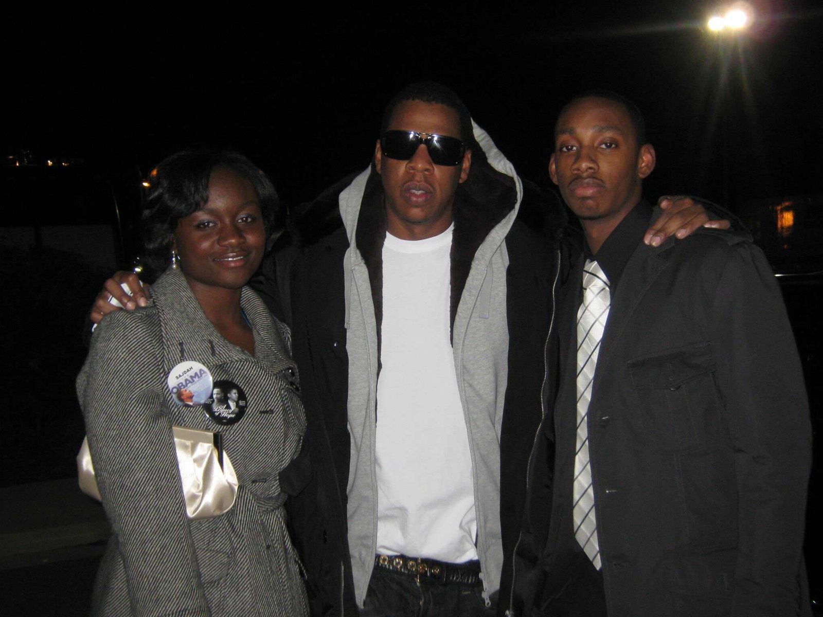 Sajdah with Jay-Z and a friend at night during inaugural weekend